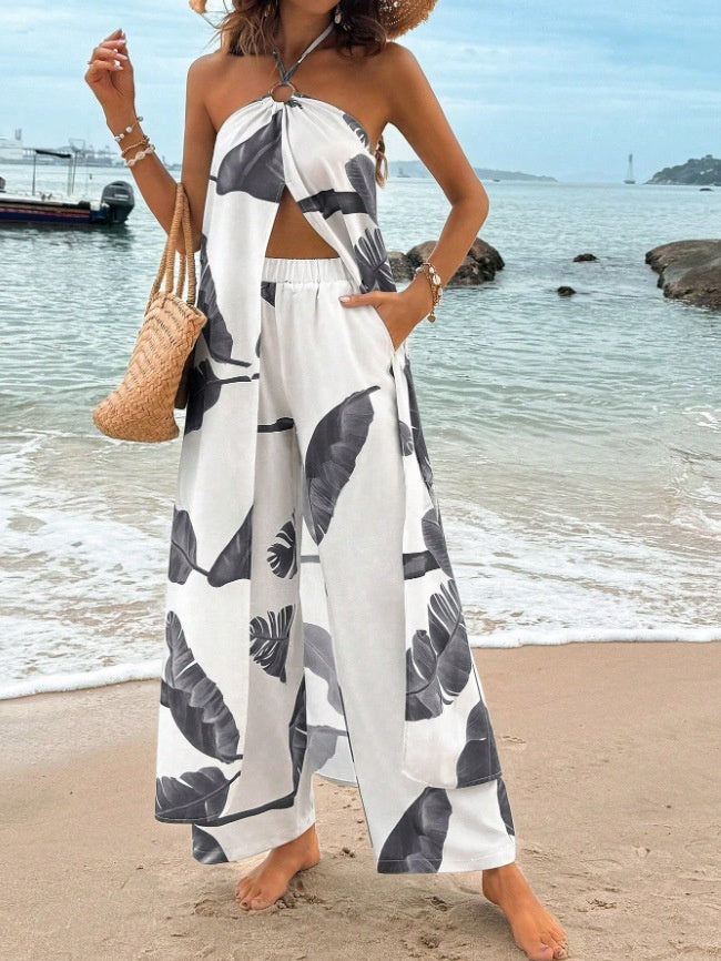 Fashionable Resort-Style Printed Halterneck Slit Jumpsuit With Wide-Leg Pants